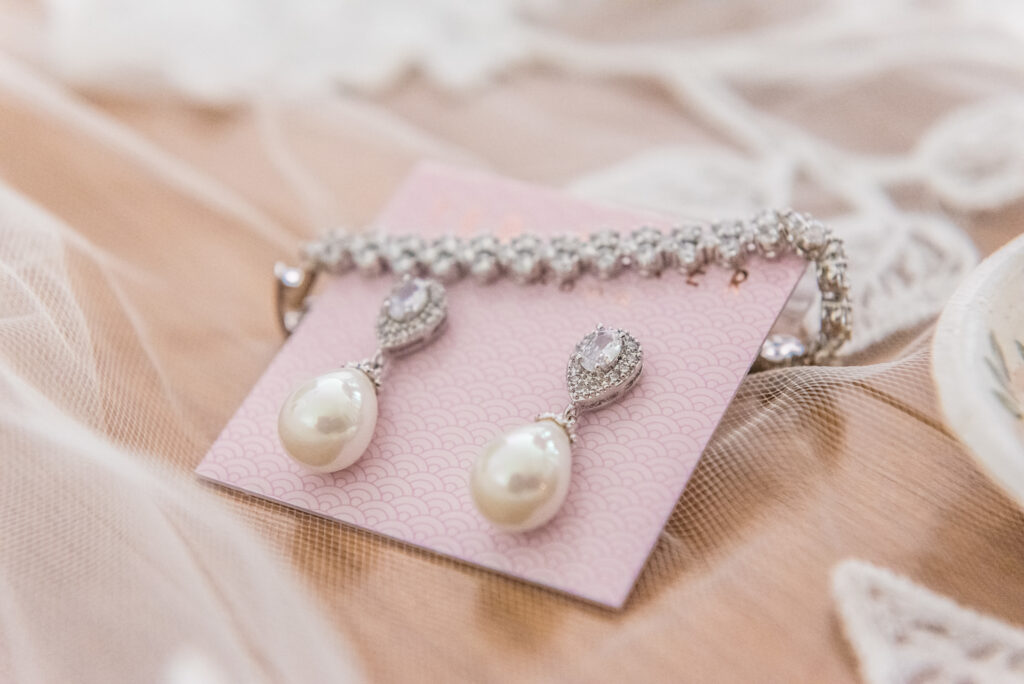 Close up of pearl wedding jewelry set